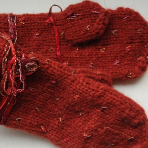 Hand-knitted children&#39;s mittens