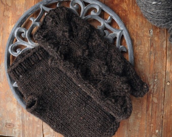 Hand-knitted gloves or cuffs