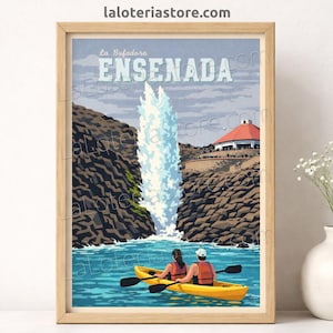 May include: A framed print featuring a vintage travel poster design of Ensenada, Mexico. The artwork depicts a geyser, kayakers, and a building. The text "ENSENADA" is prominently displayed. The print is in a wooden frame.