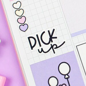 May include: A planner page with the word "TODAY" at the top. The page has a grid pattern and includes stickers with hearts, a bow, and a cake with balloons. The text "DICK up" is also visible.