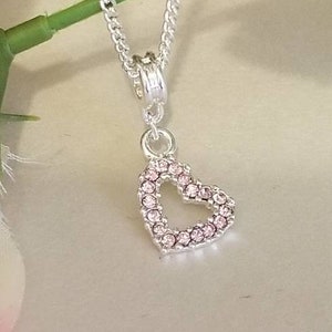 Pink rhinestone heart charm necklace