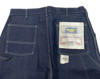 Vintage 1980s Deadstock OshKosh Dungaree Jeans measure 35 x 31