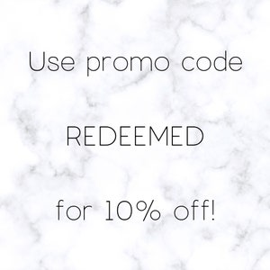 May include: White marble background with black text that reads "Use promo code REDEEMED for 10% off!"