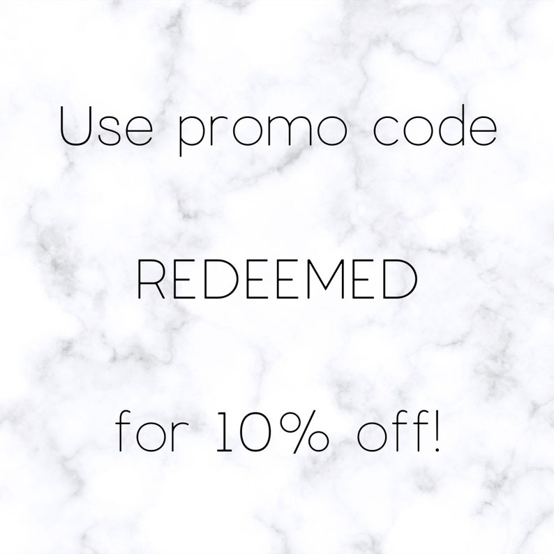 May include: White marble background with black text that reads "Use promo code REDEEMED for 10% off!"