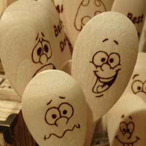 Hand engraved wooden spoons facial impressions image 2