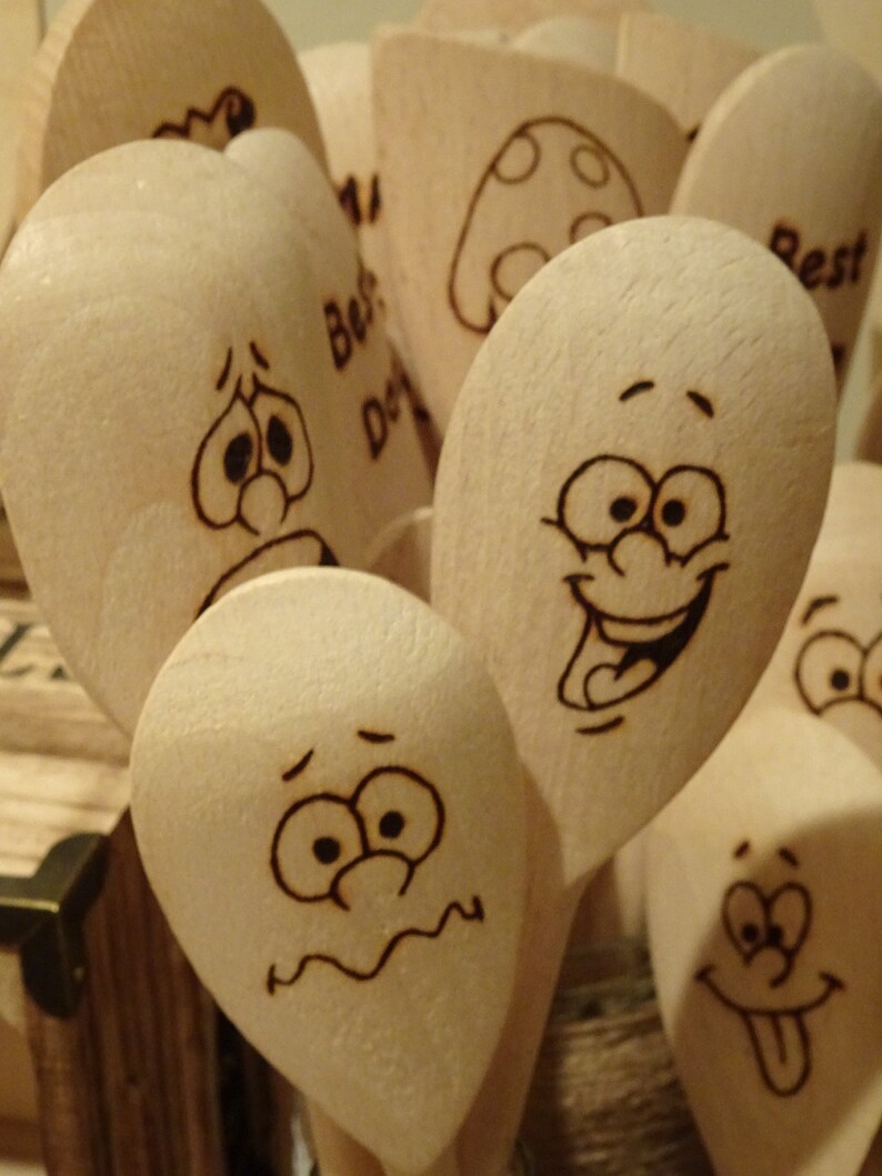 Hand engraved wooden spoons facial impressions image 2