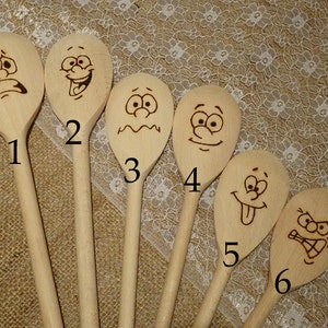 Hand engraved wooden spoons facial impressions image 1