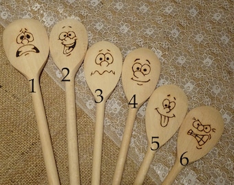 Hand engraved wooden spoons (facial impressions)