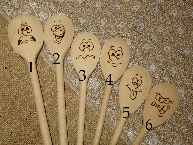 Hand engraved wooden spoons facial impressions image 1