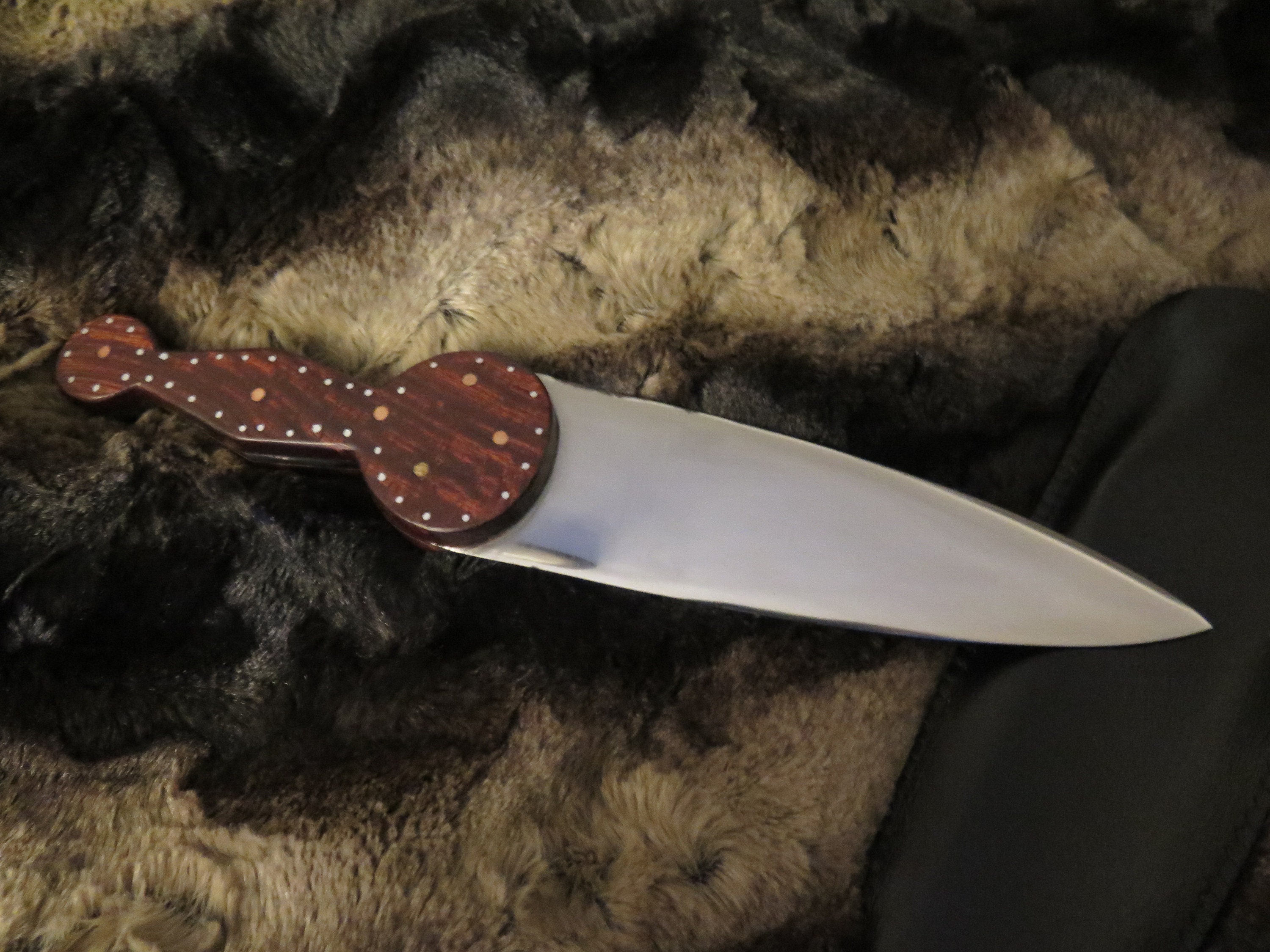 Cree Northern Plains Knife heavily decorated brass and steel pins in a rosewood handle blade 7