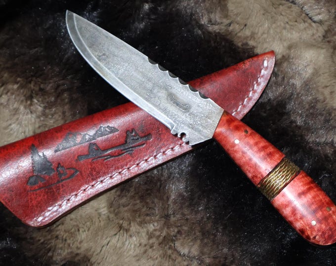 French Trade knife a accurate reproduction of this historical artifact this Large Red Brass Wire Wrapped Knife Comes with a pictorial sheath