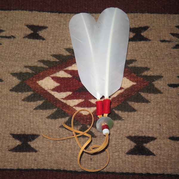 Native American Hair Tie as part of your Regalia hand made Bald Eagle Tail Feathers are attached that's the Symbolism and Power