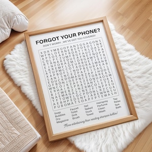 May include: A black and white printable word search puzzle with the title "Forgot Your Phone? Don't Worry, We've Got You Covered!" The puzzle features words related to bathroom items, such as soap, towel, and faucet.