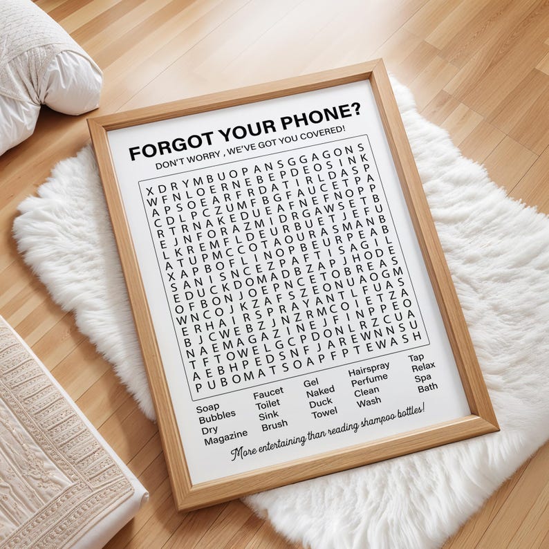 May include: A black and white printable word search puzzle with the title "Forgot Your Phone? Don't Worry, We've Got You Covered!" The puzzle features words related to bathroom items, such as soap, towel, and faucet.