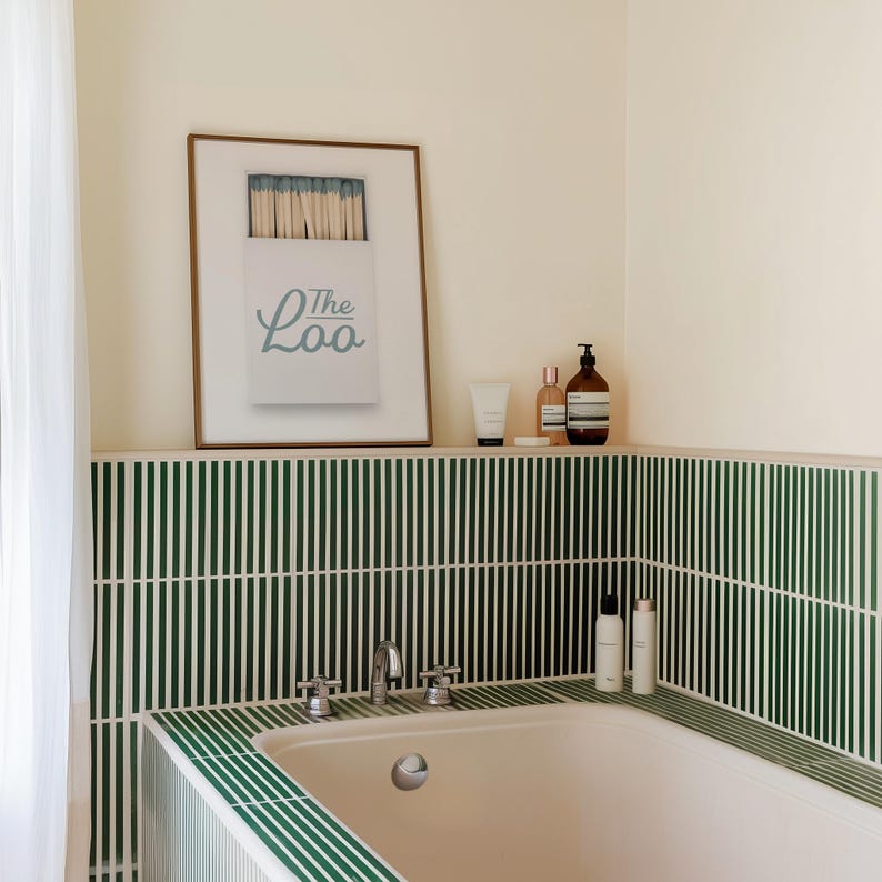 Bathroom Matchbook Print with The Loo written in cursive on the matchbook