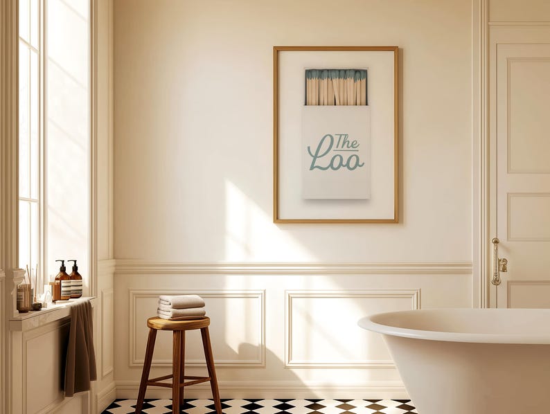 Bathroom Matchbook Print with The Loo written in cursive on the matchbook