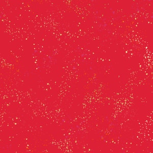 May include: A red background with a scattered pattern of small gold, orange, and purple dots.