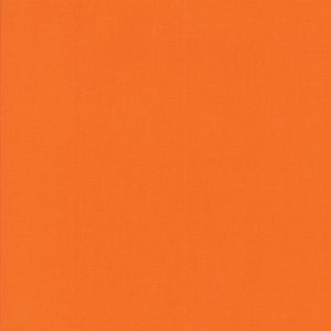 May include: Solid orange fabric swatch. The fabric has a smooth, even texture.