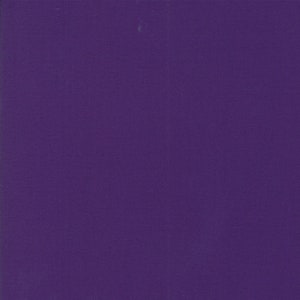 May include: A solid purple background.