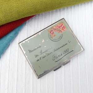 Polvera de París Expo 1937, diseño de letras con sello y estampilla en el reverso, tamiz original, tal como se ve con el espejo roto, rara primicia de 1937