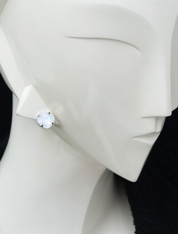 Orecchini in oro bianco 18k a castone con diamanti, ct. 0,20 | GV Orecchini in oro bianco 18k a castone con diamanti, ct. 0,20 | GV