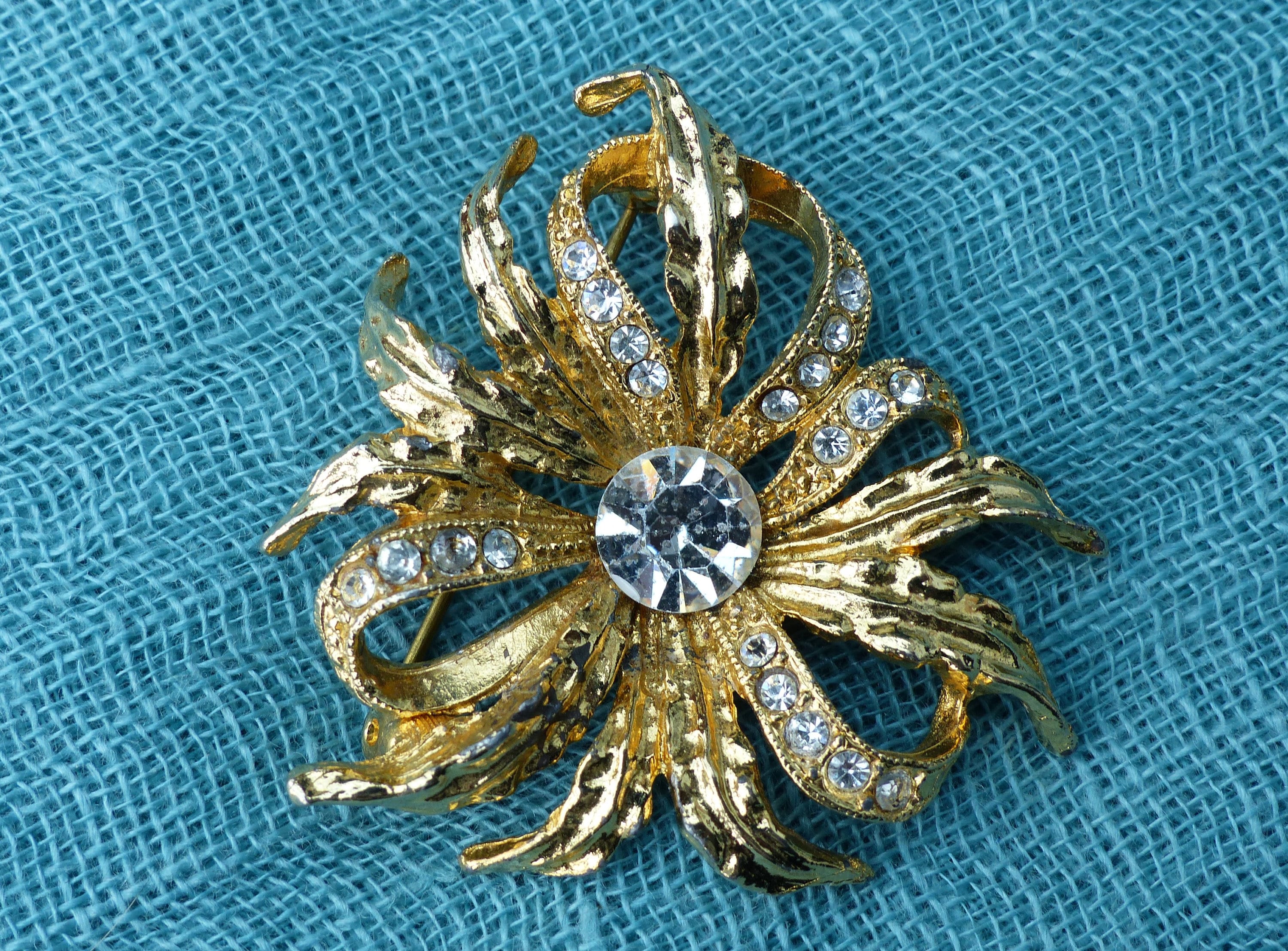 Spilla vintage a forma di fiore in oro e citrin