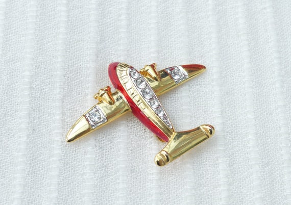 Aeroplane brooch hotsell