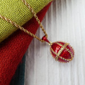 Vintage 1990s Red Enamel Egg Pendant On Long Gold-plated Rope Twist Chain