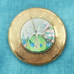Vintage 1950s Powder Compact With Victorian Lady Gathering Flowers Panel In The Centre and Floral Etched Border Design (New Puff Included)