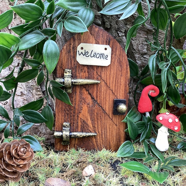 Wooden rustic fairy door, brown pixie door. Miniature fairy house,  outdoor lawn decorations, door with welcome sign, gift for gardeners