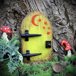 Whimsical wooden fairy door. Hand painted moon and stars design, enchanted tree ornament for gardens and fairy houses, birthday gift.