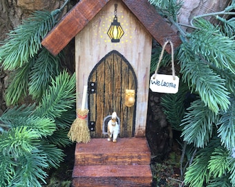 Whimsical wooden fairy door. Handmade miniature fantasy cottage door with stairs, lantern and welcome sign. A great Mother’s Day gift.