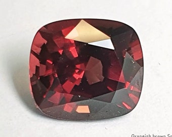 Espinélio vermelho-alaranjado de 5,21 ct, gema lapidada em almofada birmanesa.