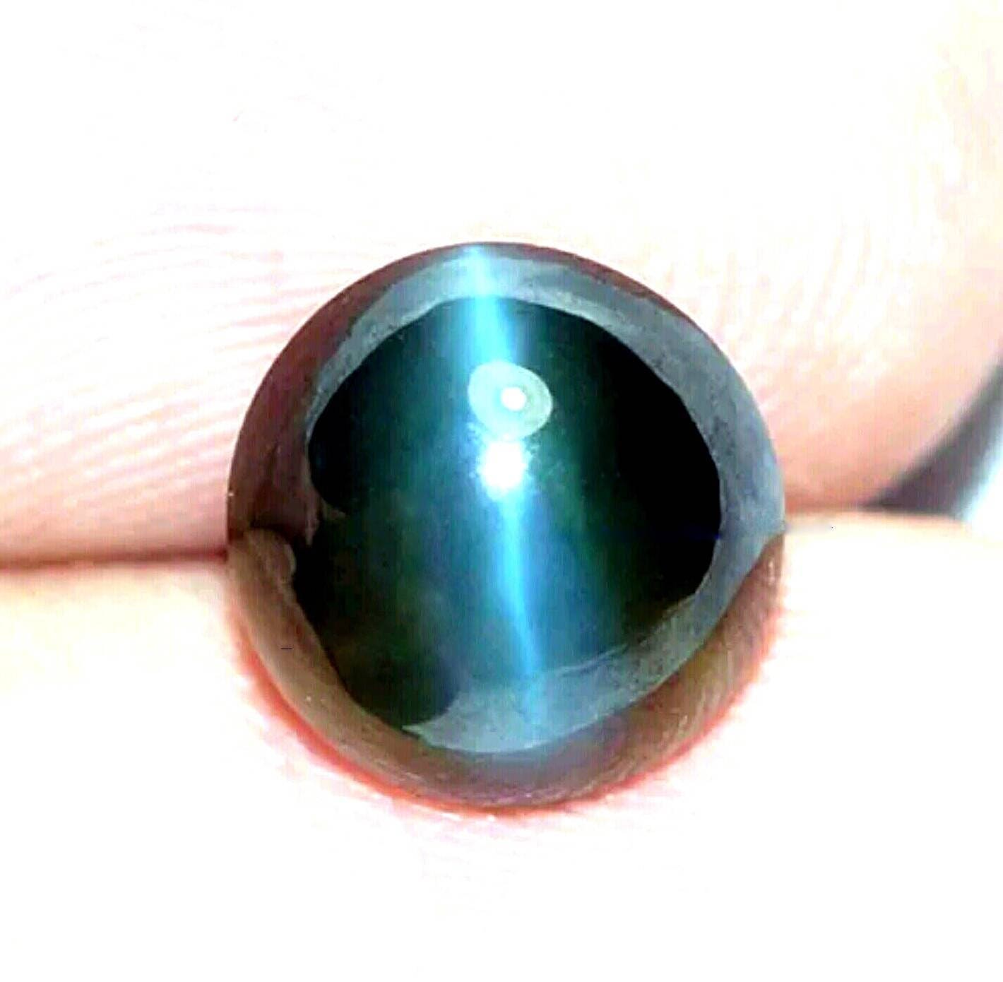 GIA certified #ALEXANDRITE CATs Eye 5.63cts double cabochan natural gemstone suitablefor collectors. Please wach its magical video.