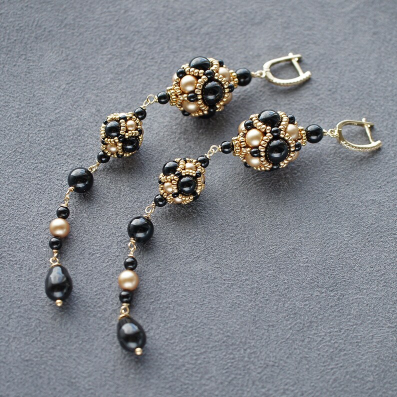Black and gold beaded earrings. Extra long dangle earrings. Etsy