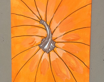 Painting called Pumpkin on a stretched canvas.