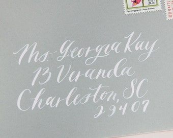 Dirección de sobres con caligrafía
