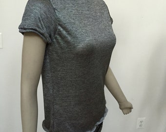 Silver Jersey Knit Turtle Neck with Cap Sleeves. Shimmery Turtle Neck. Stretch Jersey Knit Turtle Neck. Women's Elegant Tops.