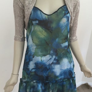 Chaqueta corta de lúrex dorado arrugado. Bolero de noche para mujer en dorado claro iridiscente. Chaqueta de top brillante. Tallas: M, L.