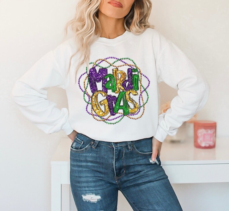 queen of sparkle mardi gras sweater