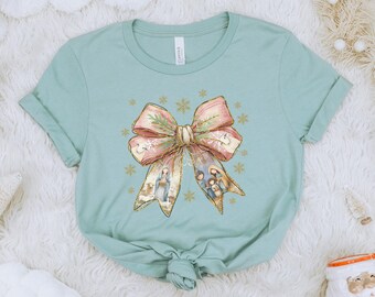 Nativity Scene Bow Tee | Bella + Canvas Christmas Shirt | Faith-Based Holiday Graphic Tee