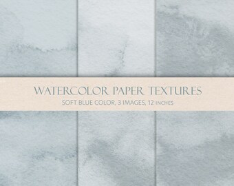Puede incluir: Tres texturas de papel acuarela en tonos azul suave. Cada textura tiene 12 pulgadas de ancho y presenta sutiles variaciones en color y textura.