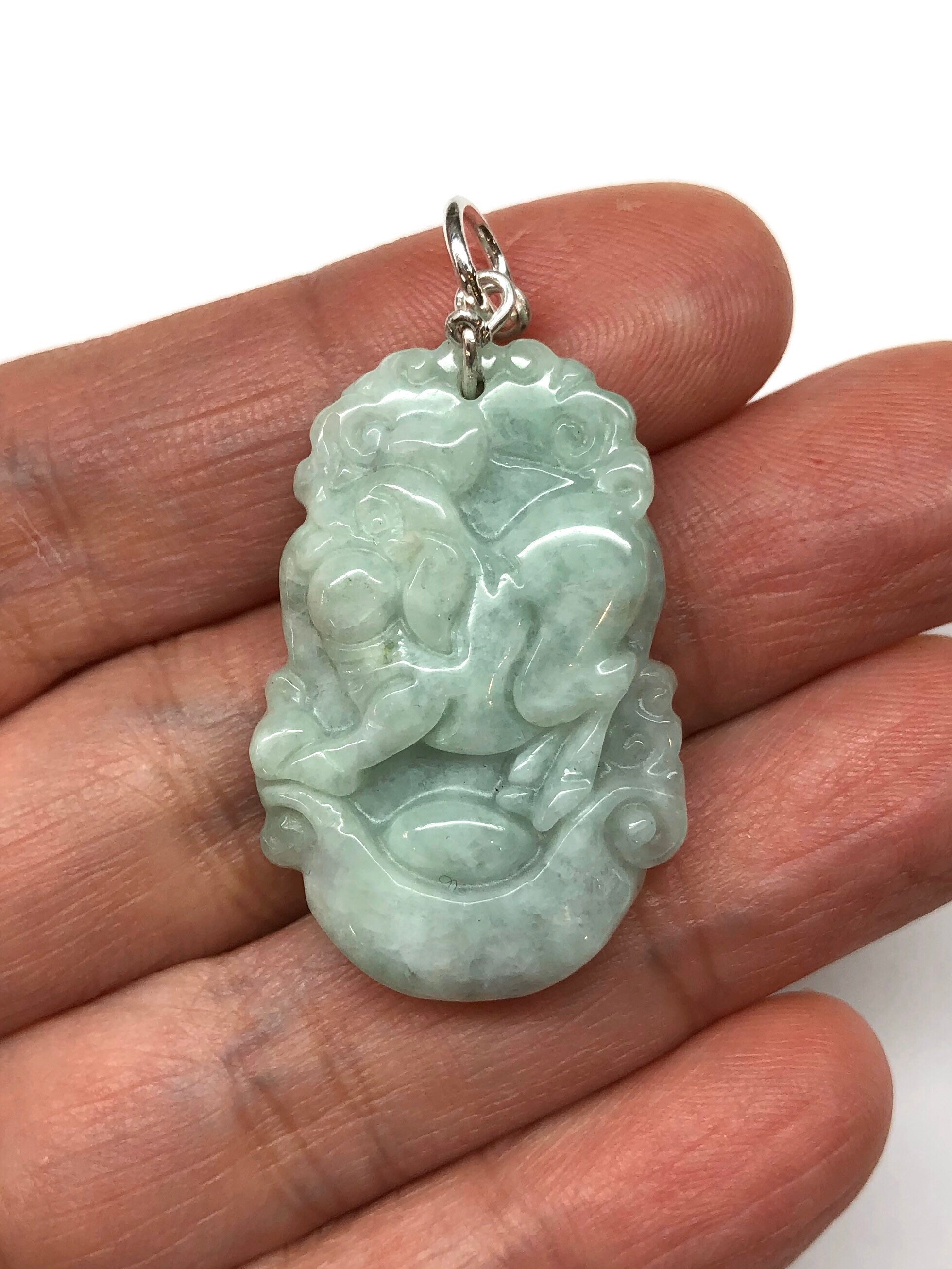 Pig shop jade pendant