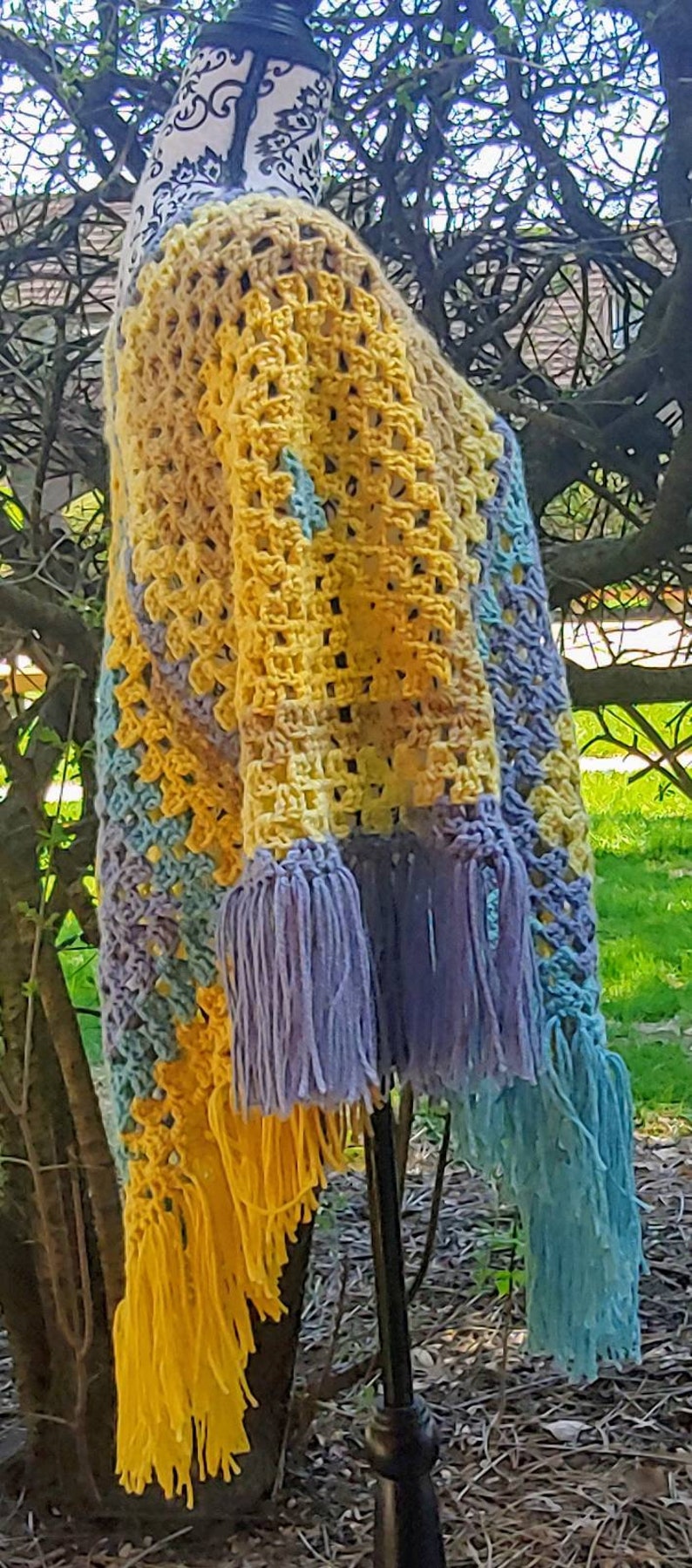 1970s themed poncho. Vintage inspired poncho Colorful crochet poncho In tones of blue and yellow