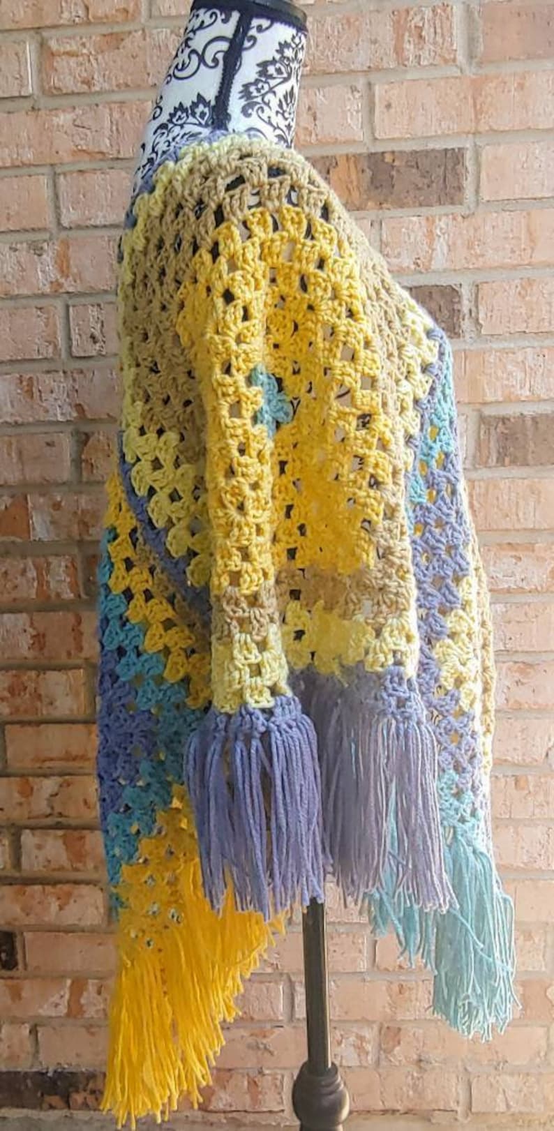 1970s themed poncho. Vintage inspired poncho Colorful crochet poncho In tones of blue and yellow
