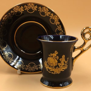 Limoges Castel Porcelain blue & 22k gold demitasse / chocolate cup and saucer duo.