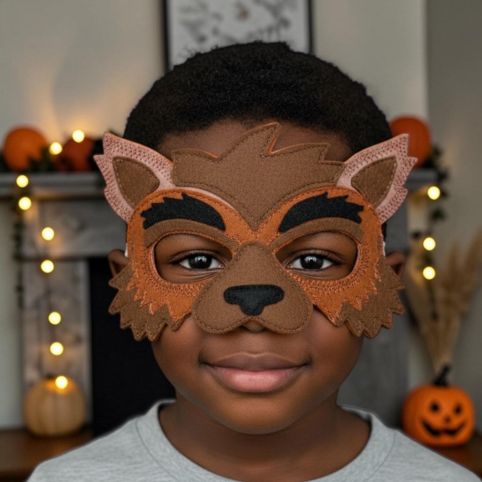 Brown werewolf felt mask with pointed ears and cheek shapes.