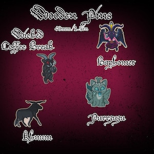 May include: A set of six wooden pins featuring various black and white illustrations of mythical creatures. The pins are 1.5 inches in diameter and feature the text "Wicked Coffee Break", "Baphomet", "Purrzuzu", and "Brown".