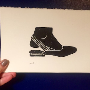 Handprinted block print: &quot;Step Off&quot;