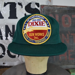 May include: A rustic wooden sign with the text "Welcome to our home" in white lettering. The sign features a distressed finish and a simple, inviting design, perfect for a front porch or entryway.